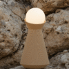 Sera lamp among stones, illustration for A Lamp That Sets the Mood
